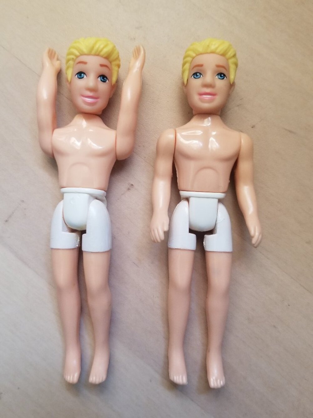 Two Small Male Formable Dolls